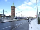 Aarhus Stadtbahn Linie L2 mit Niederflurgelenkwagen 2110-2210 am Vandtårnet (2021)