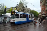 Amsterdam Straßenbahnlinie 5 mit Gelenkwagen 910 am Leidseplein (2011)