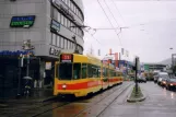 Basel Straßenbahnlinie 11 mit Gelenkwagen 205 am Dreispitz (2006)