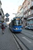 Krakau Straßenbahnlinie 20 mit Gelenkwagen 3013 am Filharmonia (2011)