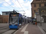 Rostock Straßenbahnlinie 1 mit Niederflurgelenkwagen 607 am Steintor IHK (2015)