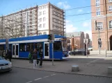 Rostock Straßenbahnlinie 5 mit Niederflurgelenkwagen 665nah Lange Str. (2015)