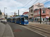 Rostock Straßenbahnlinie 6 mit Niederflurgelenkwagen 666 auf Doberaner Strasse (2010)