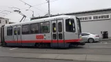 San Francisco Straßenbahnlinie N Judah mit Gelenkwagen 1405 in der Kreuzung Irving St. & 9th Ave (2021)